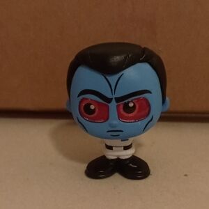 Blue and Black Action Figure Toy